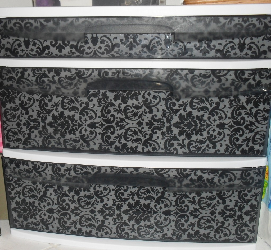 Use fabric to cover your see through drawers
