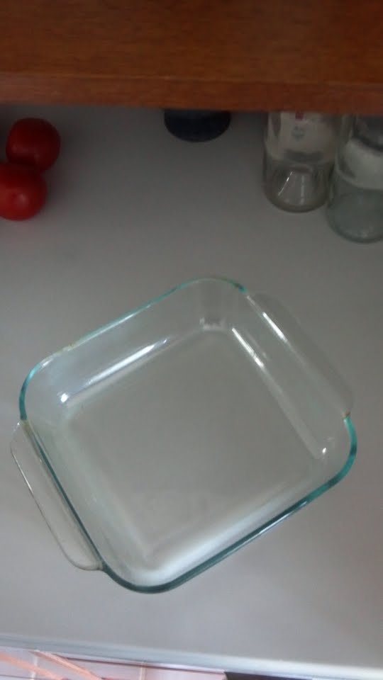Clean Pyrex glass dish with magic eraser