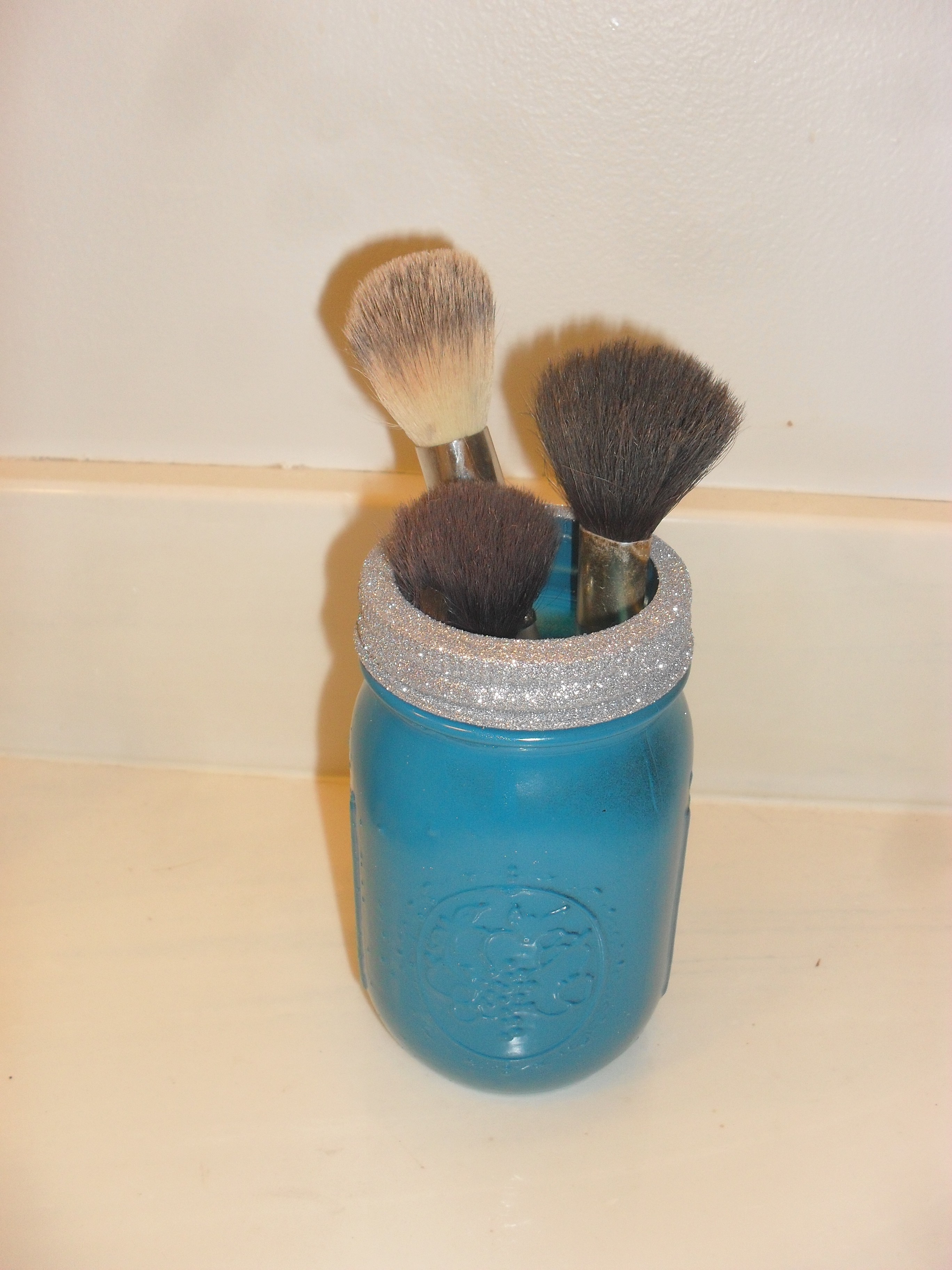 makeup brushes in mason jar