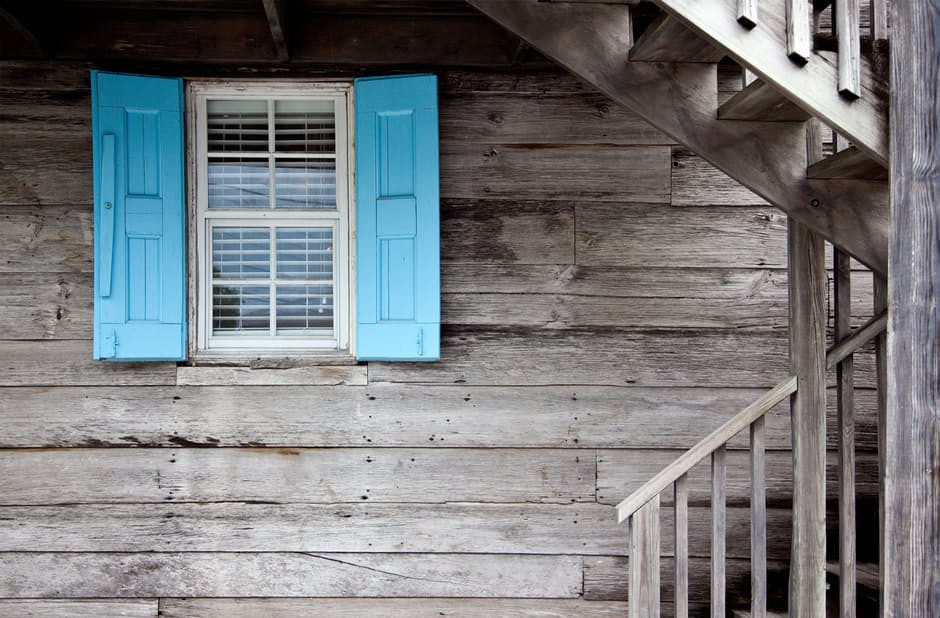 renting a house blue shade window