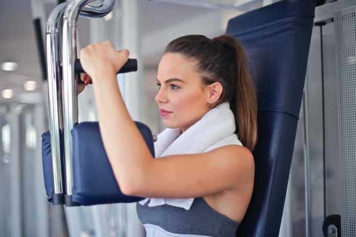 Joining A Gym girl weight training