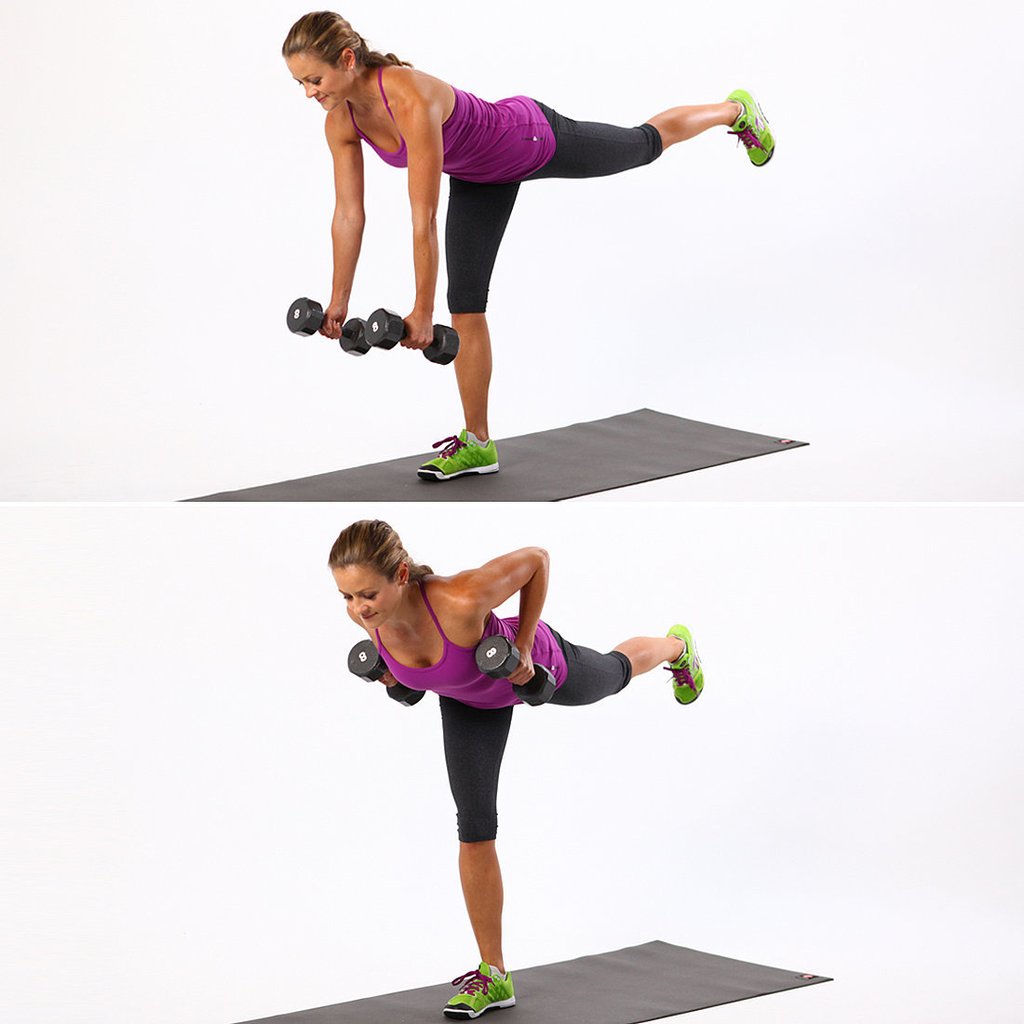 Kettlebell Workouts woman balancing with weights