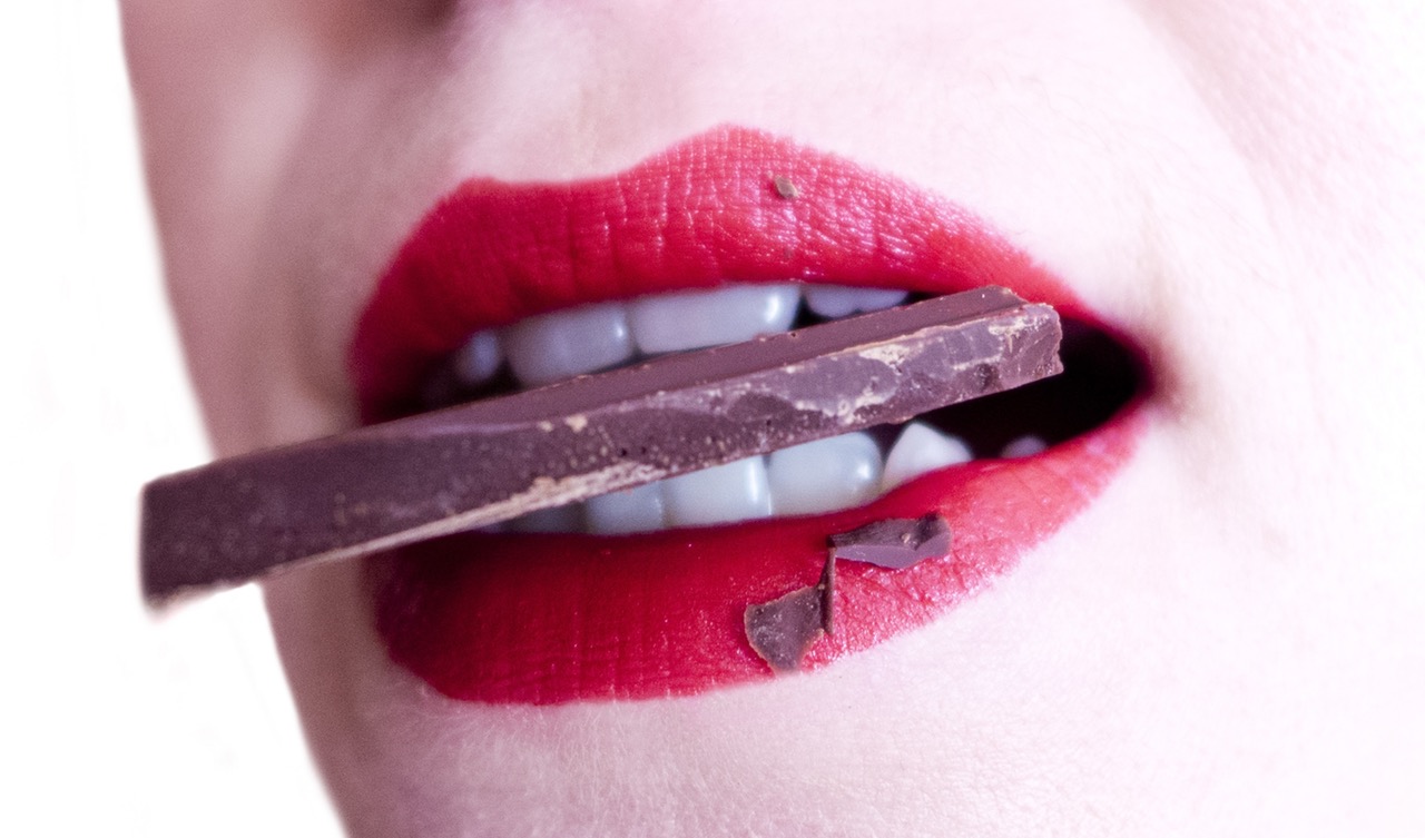 Healthy Eating Plan woman eating chocolate