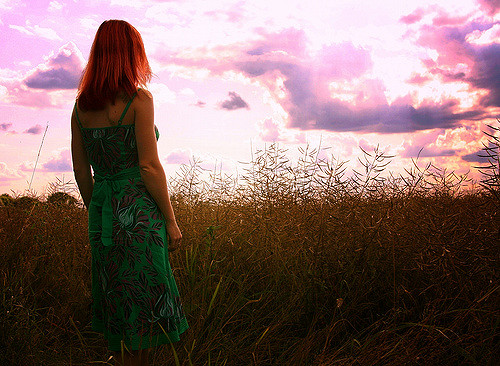 Make Your Dreams a Reality woman looking into field