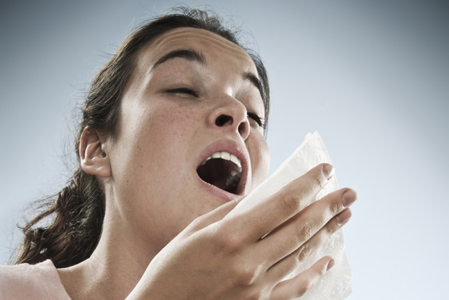 sneezing on tissue