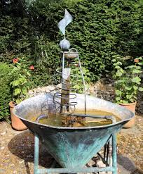Landscaping On A Budget rustic fountain