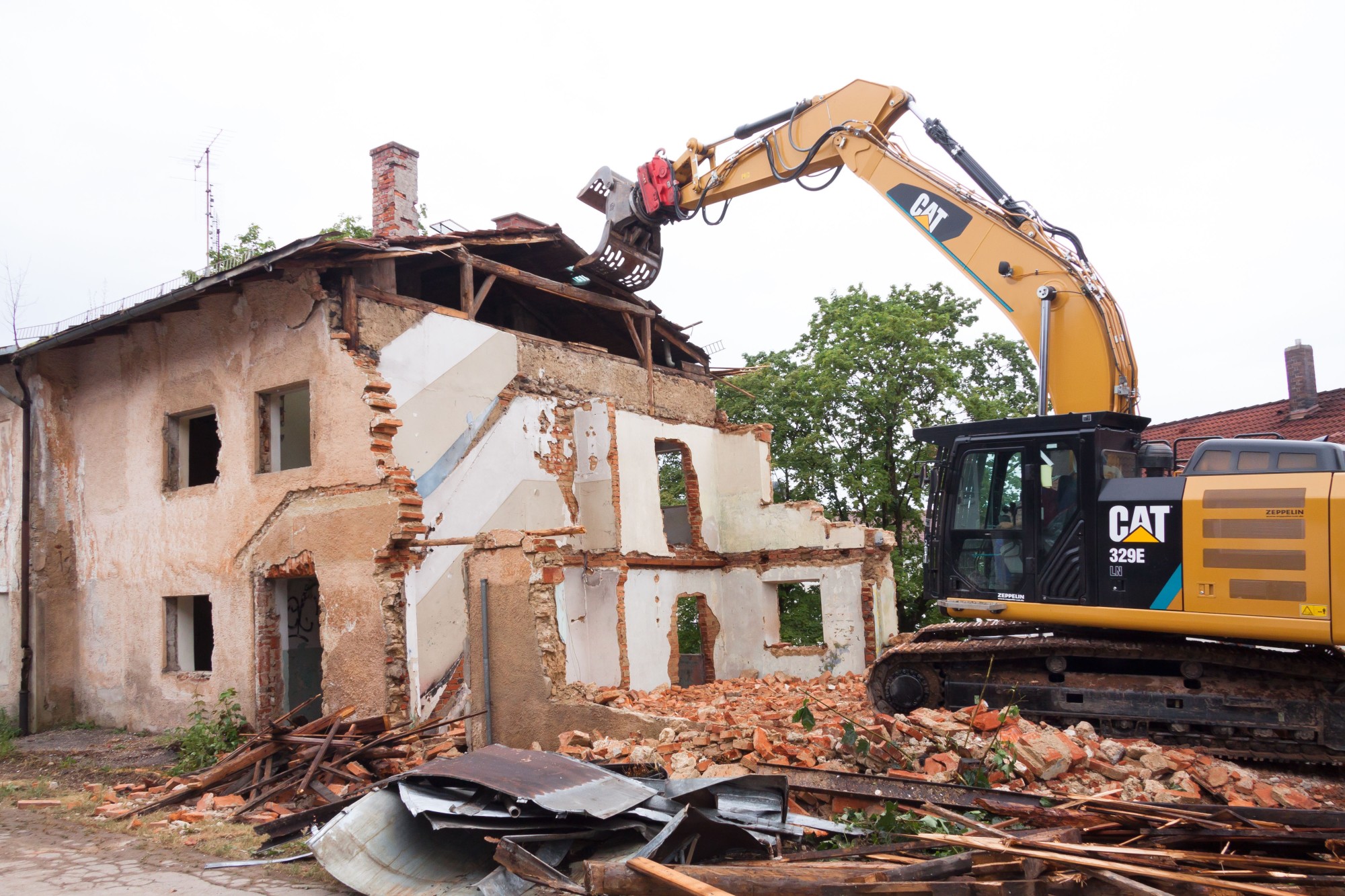 What Factors Contribute to the Cost of a House Demolition?