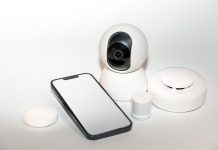 What makes a smart smoke alarm different from a standard detector?